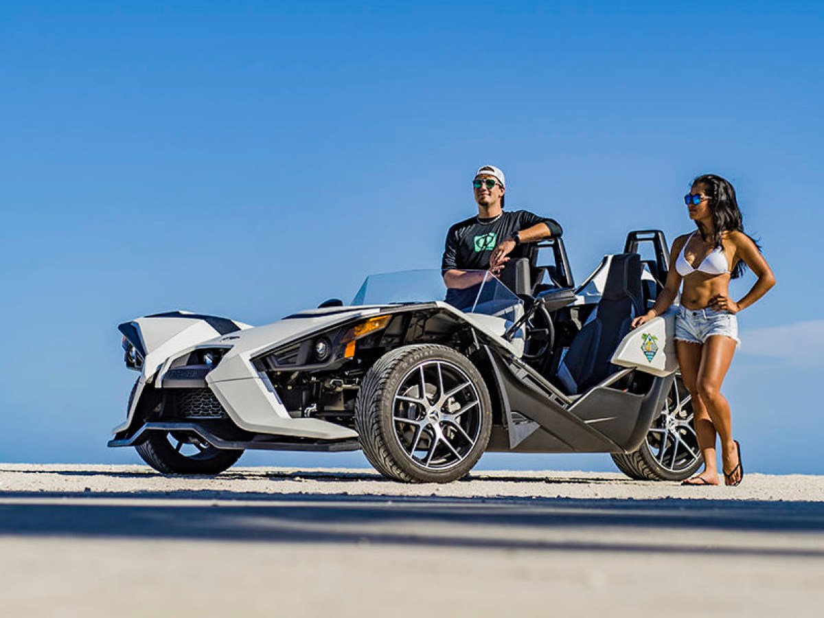 a man riding on the back of a motorcycle