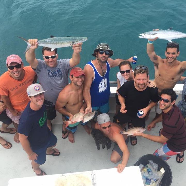 a group of people posing for the camera